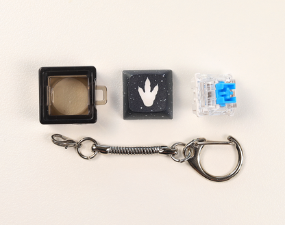 Dino Footprint Clicky Keychain